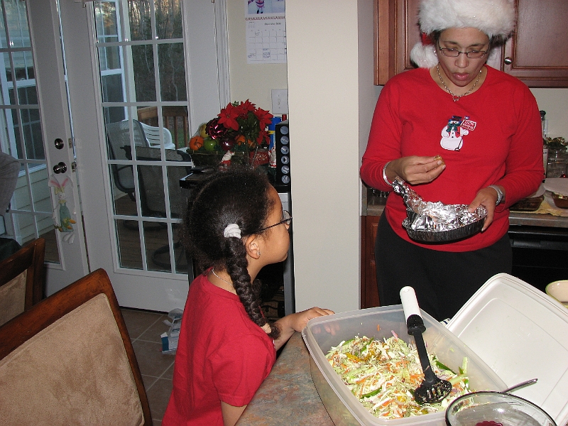 Xmas_2008_051.JPG - Getting ready for Xmas dinner.  Note the fantastic salad in the foreground.  I helped in its creation as Nanna's favorite Kitchen Serf (a proud distinction!)