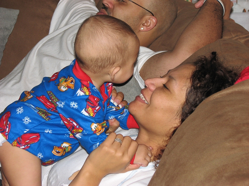 Xmas_2008_174.JPG - Kareem, Janet and Malik relaxing after a long trip cross-country