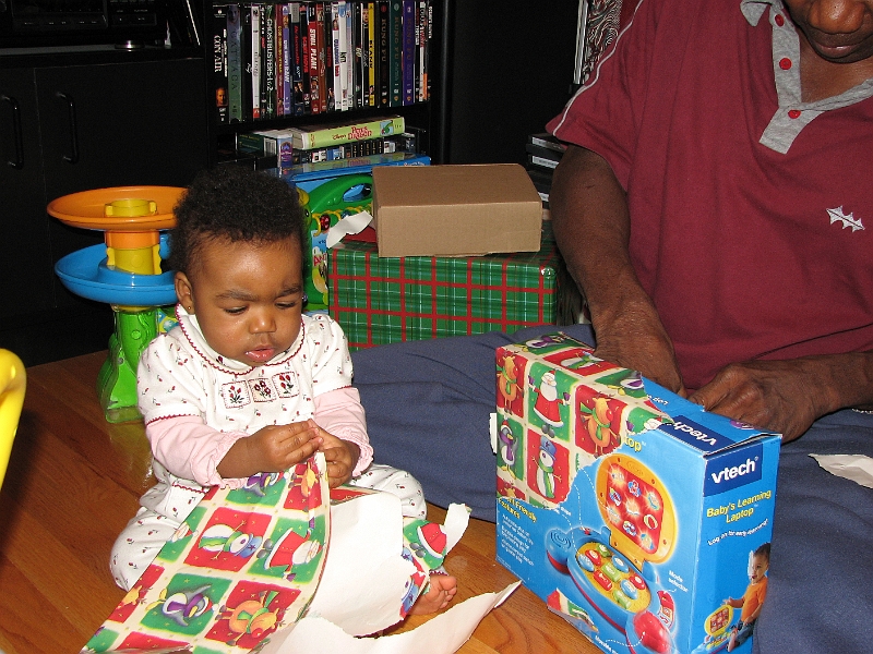 Xmas_2008_277.JPG - Of course, the wrapping paper is a *slight* distraction