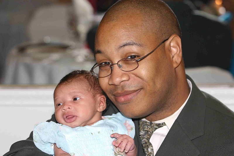 0515COPYRIGHTEDIMG_7487.JPG - Thad and daughter Kalani...only three weeks old!