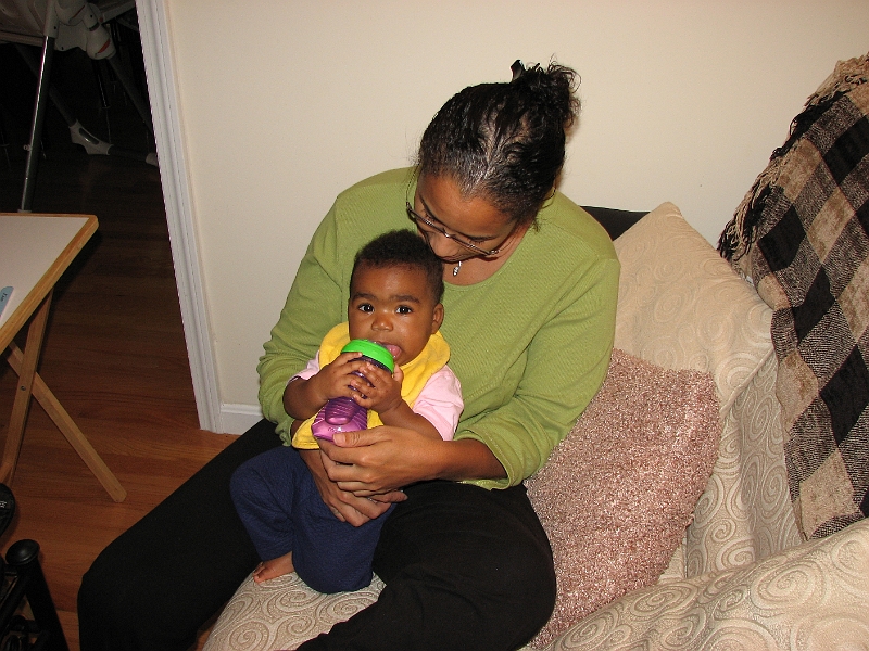 Halloween_Swim_000.JPG - Relaxing with Mommy and sippy cup