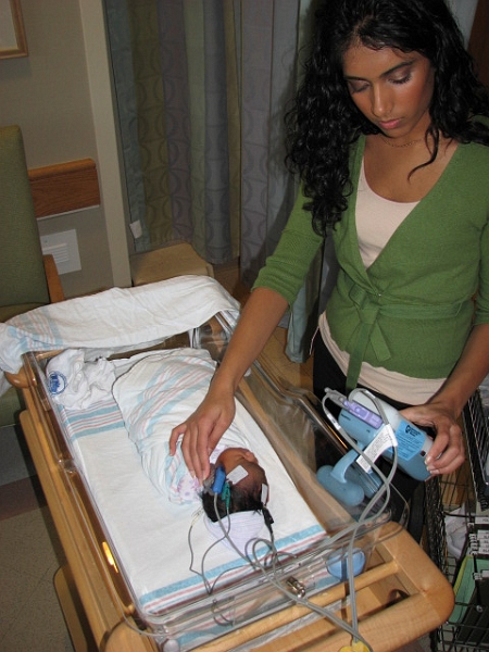 More_Mikayla_025.JPG - Mikayla undergoing her Newborn Infant Hearing Screening test.  She got an A+  :-)